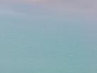 哈勃发现大麦哲伦云中的“绿松石色海洋” 包含大量闪烁恒星和旋转的气体云